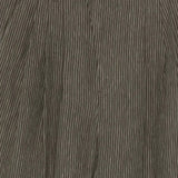 Close up of brown pants, showing texture of the linen fabric