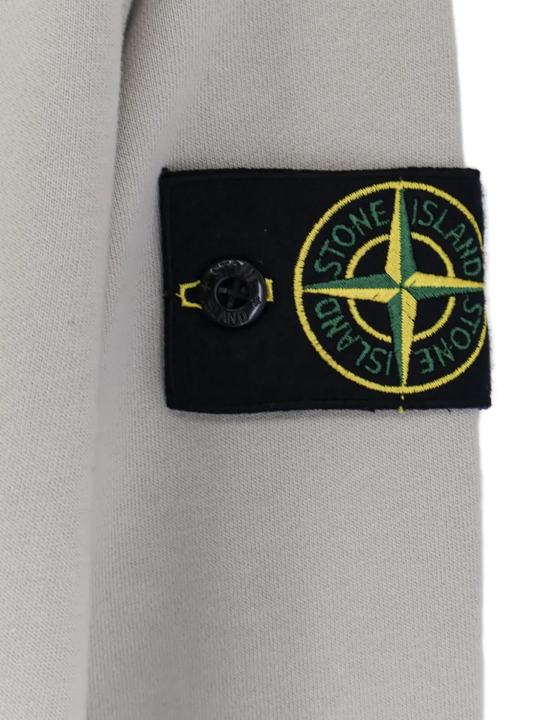 Close up of the grey hoodie, showing texture of the cotton fabric