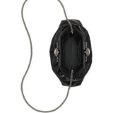 Close up of black bags, showing texture of the leather fabric