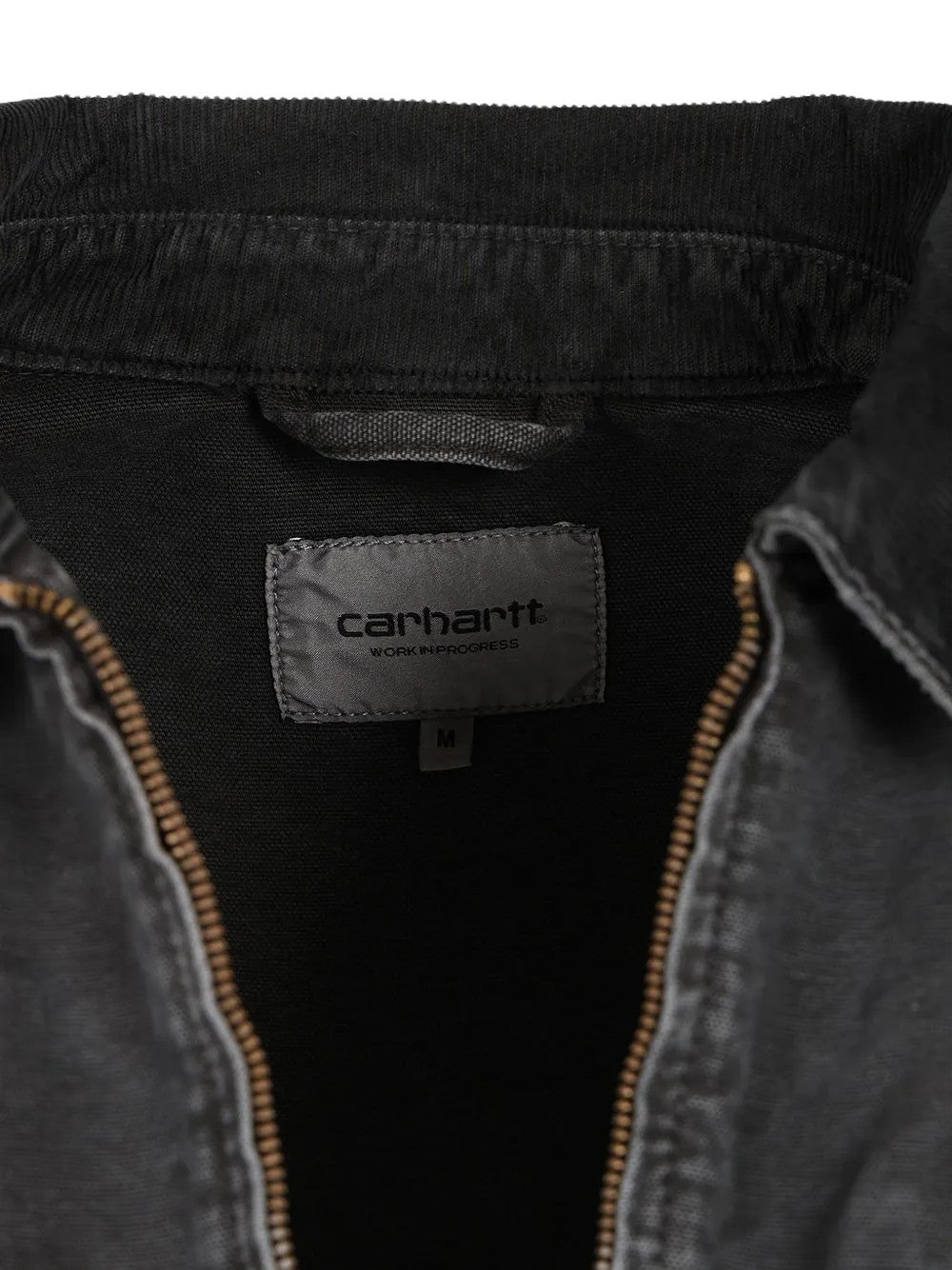 Close up of Black jacket, showing texture of the 100% cotton fabric