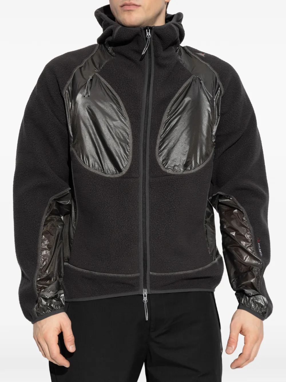 Black hoodie worn by a person, showing the hoodie fit