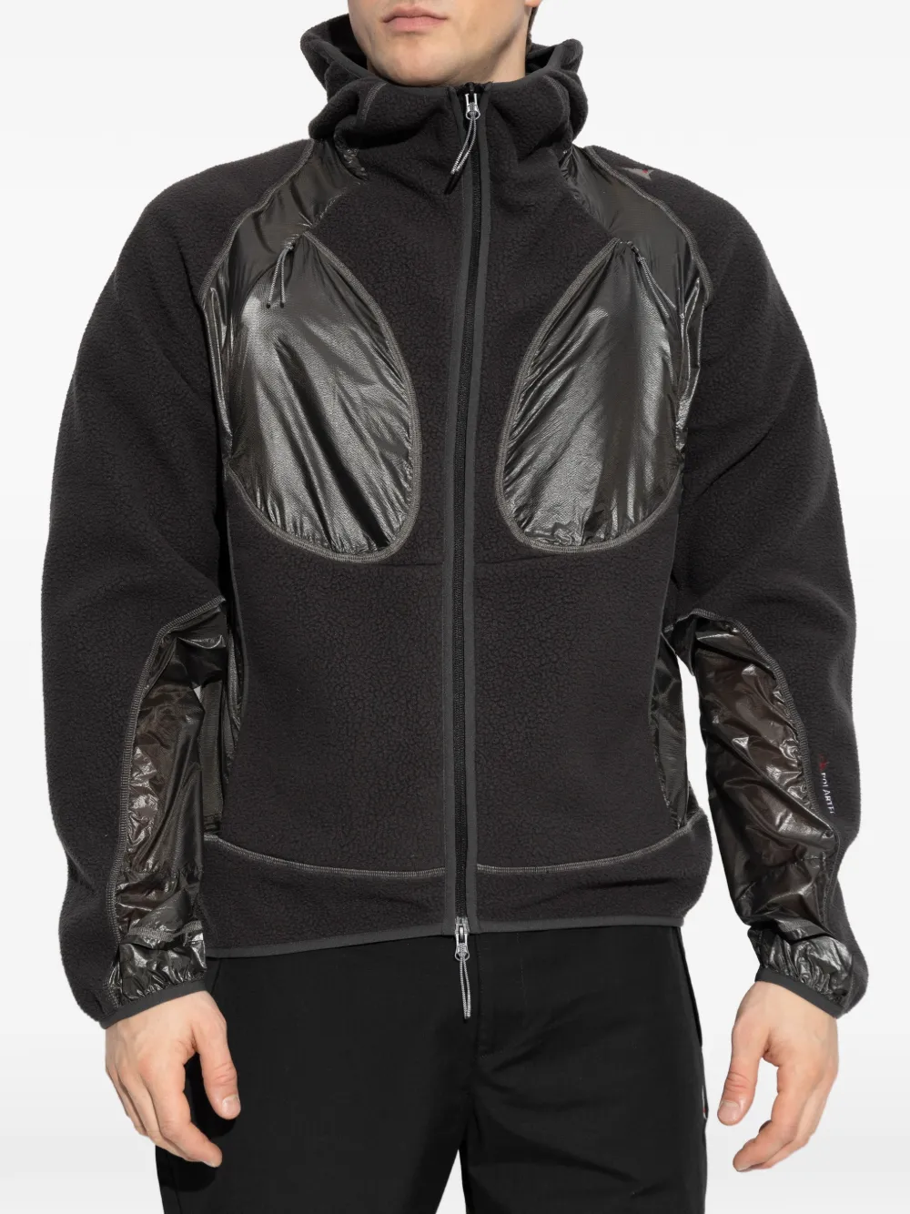 Black hoodie worn by a person, showing the hoodie fit