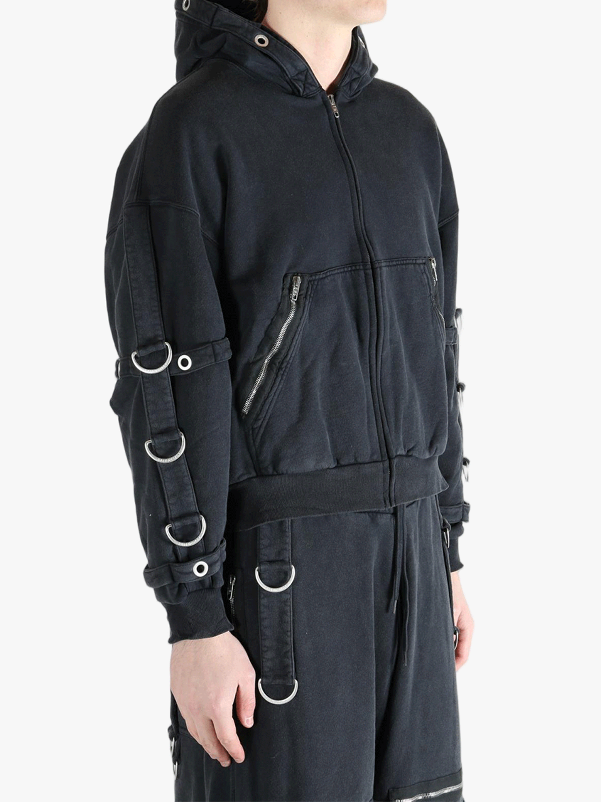 Black jacket worn by a person, showing the jacket's fit