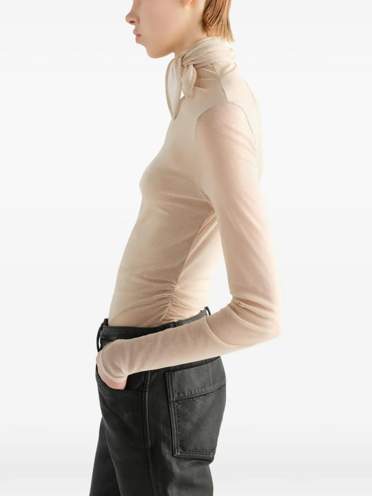 Tan top worn by a person, showing the top fit