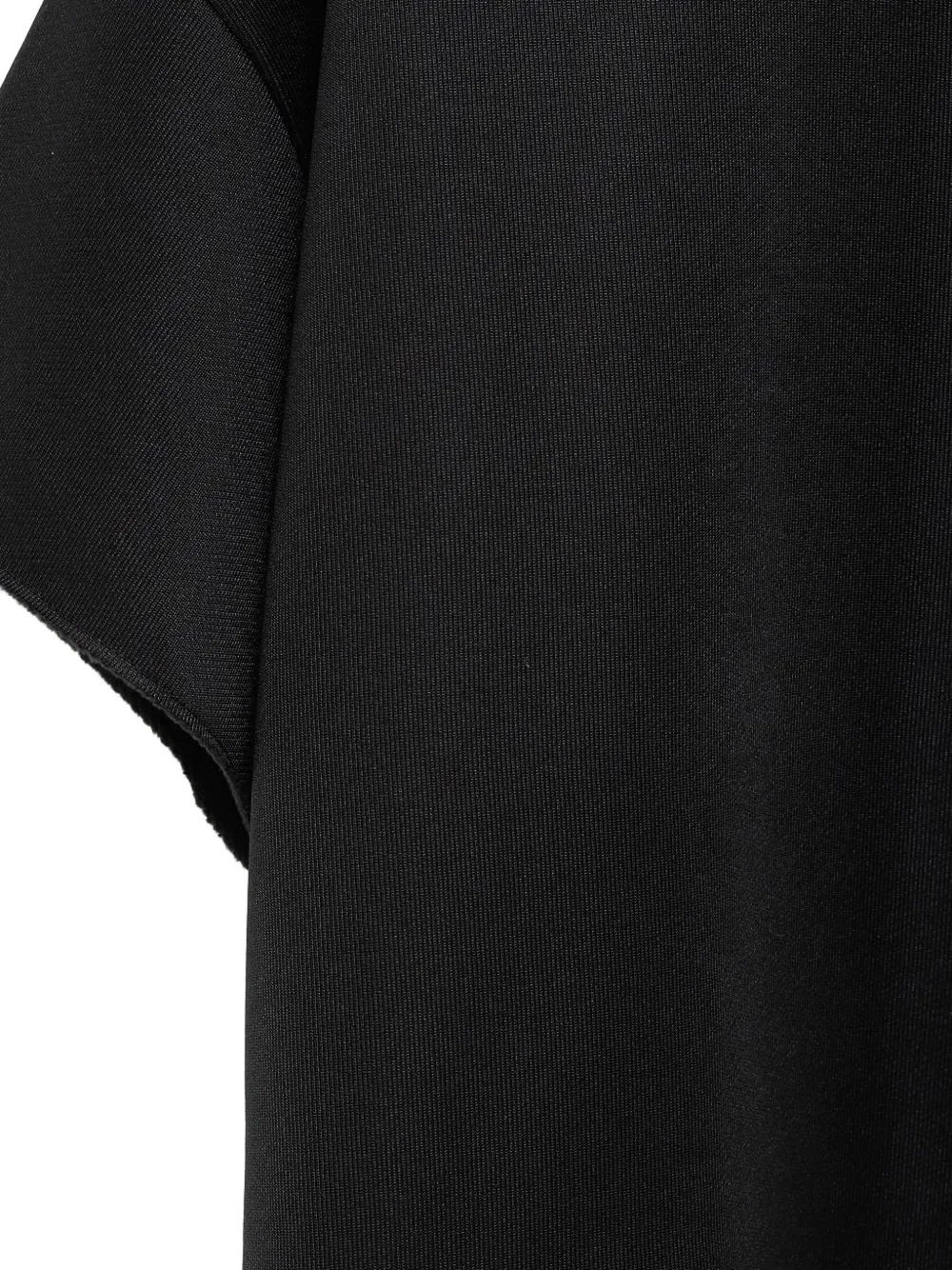 Close up of black t-shirt, showing texture of the Polyester fabric