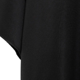 Close up of black t-shirt, showing texture of the Polyester fabric