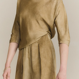 Close up of tan pants,showing texture of the cotton fabric