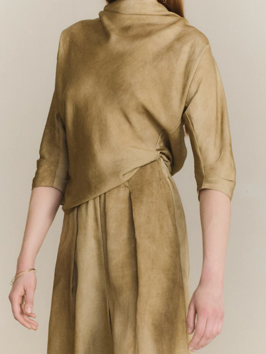 Close up of tan pants,showing texture of the cotton fabric