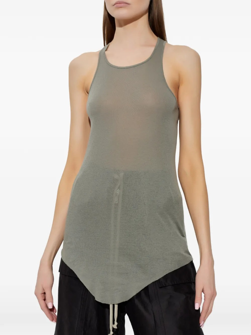 Grey tops worn by a person, showing the tops fit