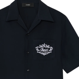 close up of black shirts, showing texture of the silk fabric