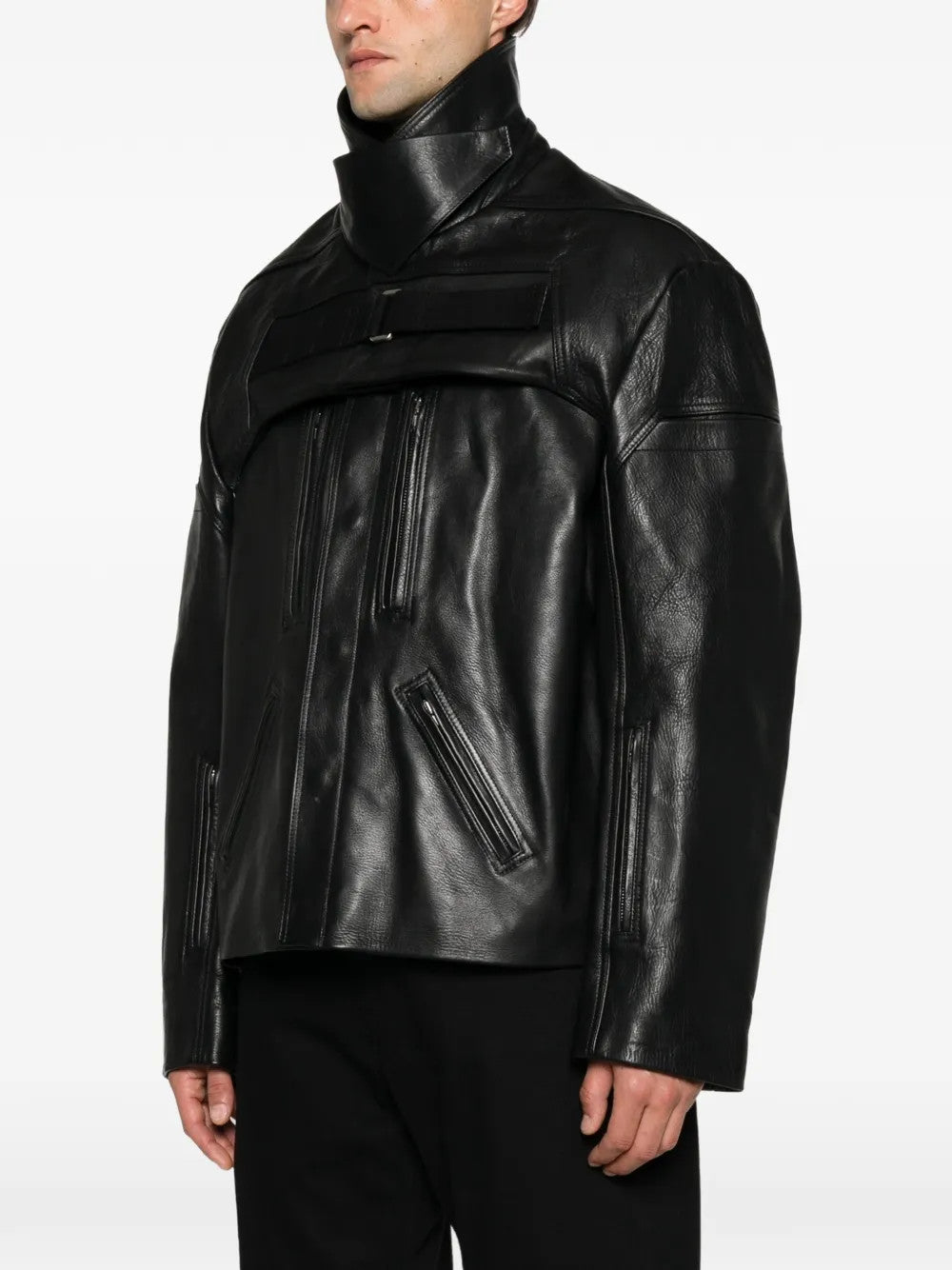 Black jacket worn by a person, showing the jacket fit