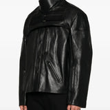 Black jacket worn by a person, showing the jacket fit