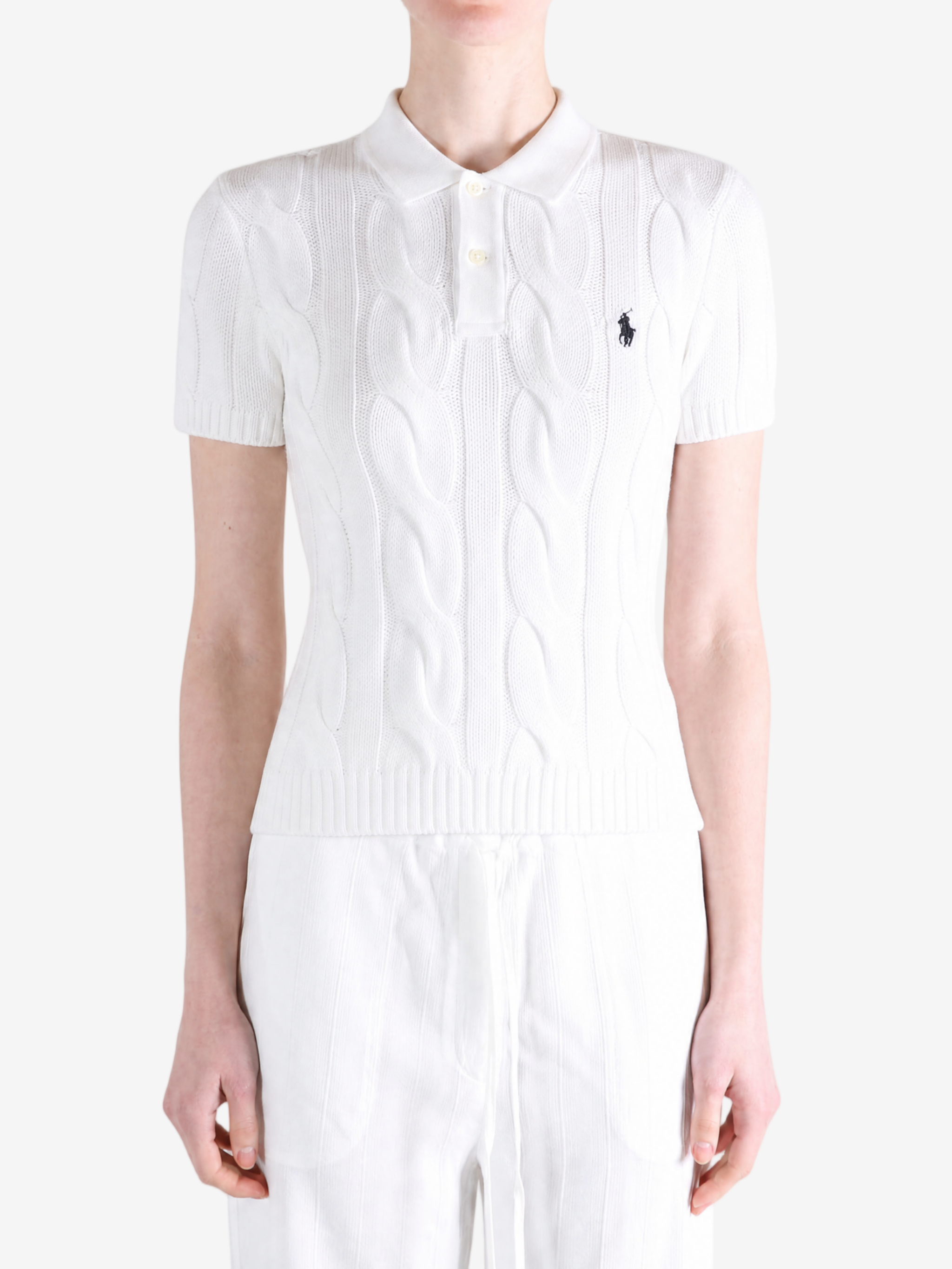 White t-shirt worn by a person, showing the t-shirt fit