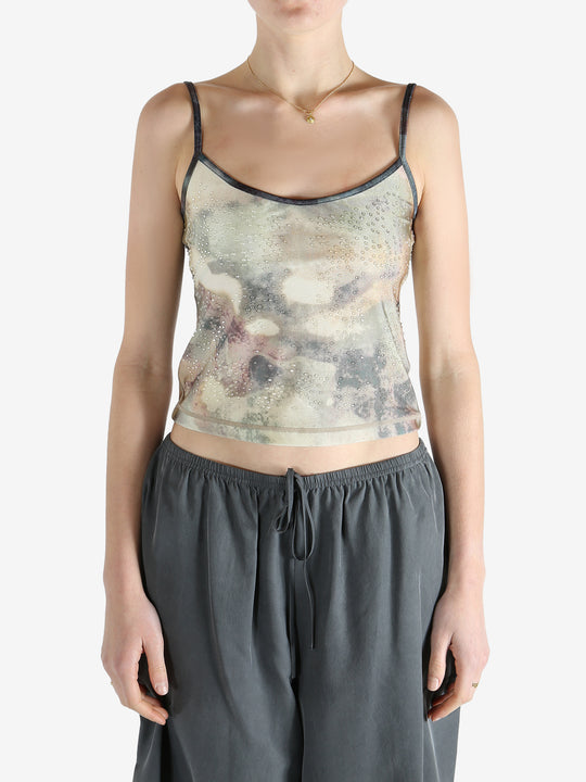 Grey top worn by a person, showing the fit