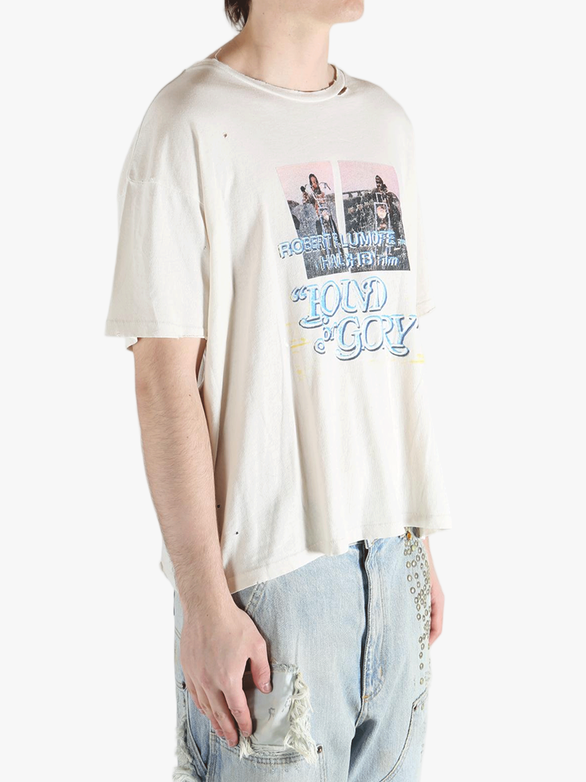 White t-shirt worn by a person, showing the shirt's fit