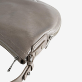 Close up of grey bag,showing texture of the leather fabric