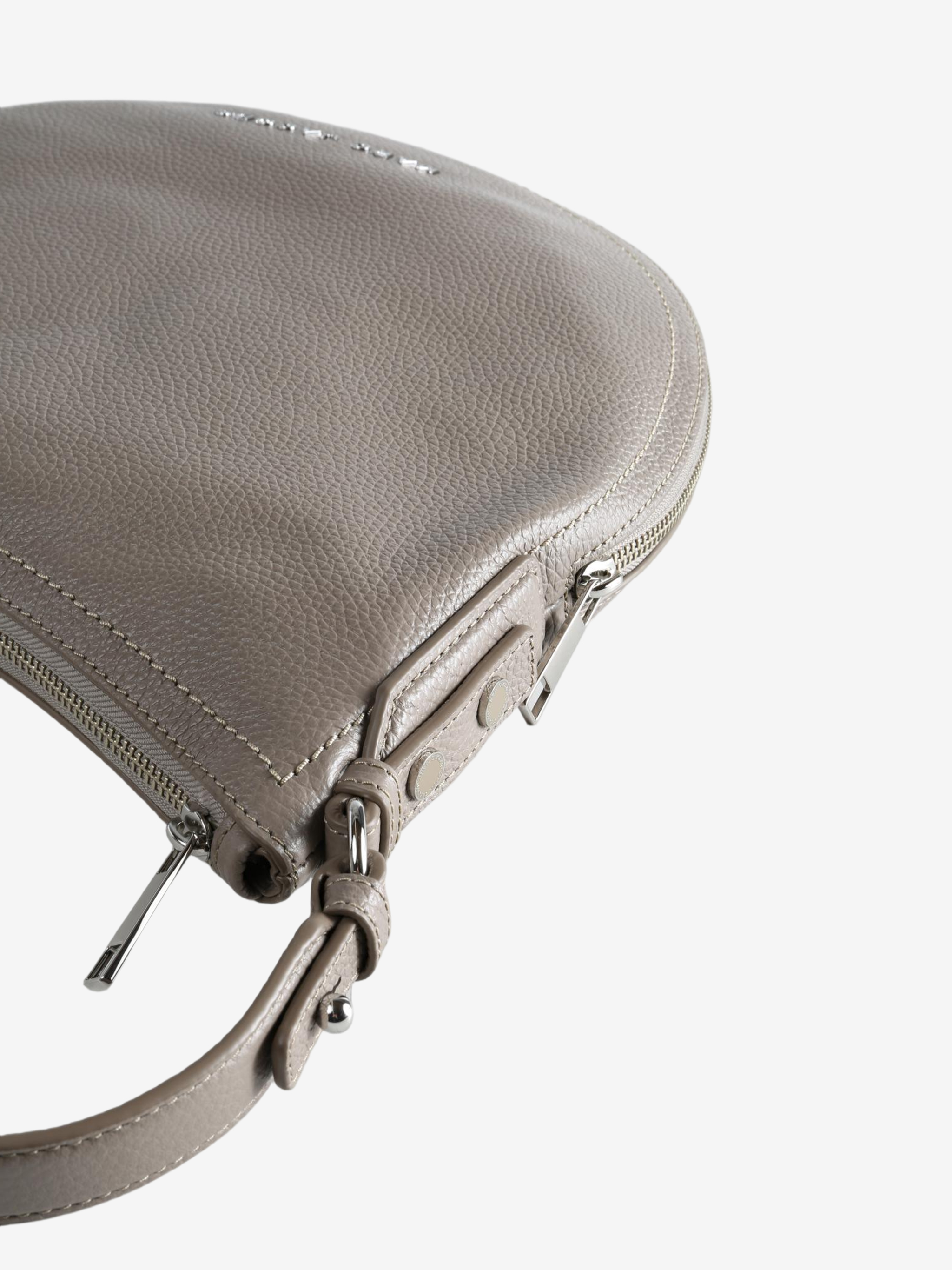 Close up of grey bag,showing texture of the leather fabric