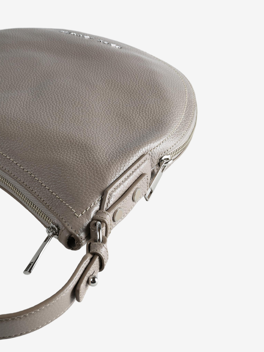 Close up of grey bag,showing texture of the leather fabric