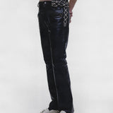 Black pants worn by a person, showing the pants fit