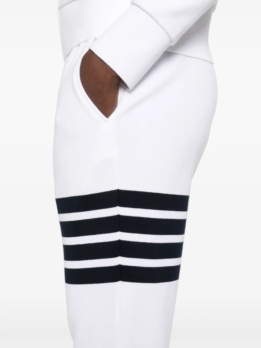 Close up of white pants, showing texture of the cotton fabric