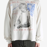 White t-shirt worn by a person, showing the t-shirt's fit