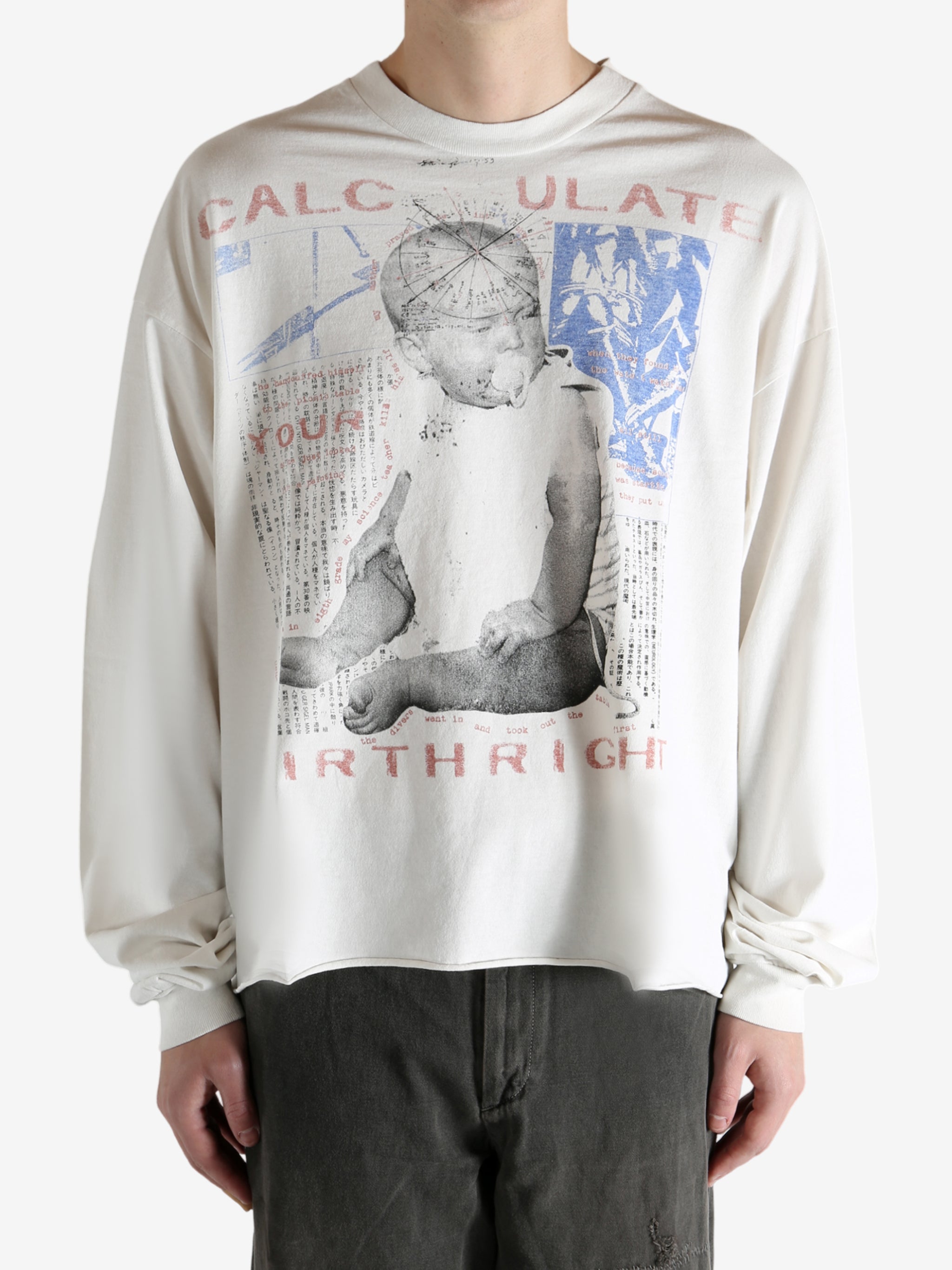 White t-shirt worn by a person, showing the t-shirt's fit