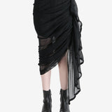 Black skirt worn by a person, showing the skirt fit