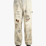 Grey pants worn by a person, showing the pants fit