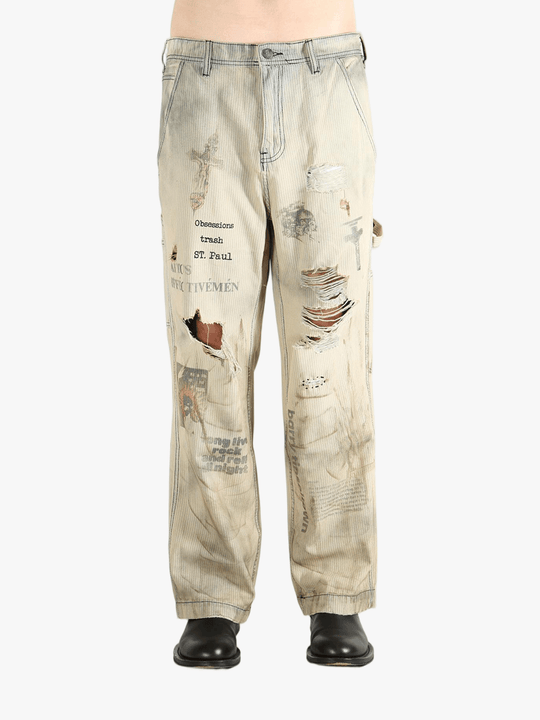 Grey pants worn by a person, showing the pants fit