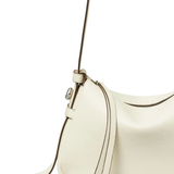 Close up of White bags, showing texture of the calf Leather fabric