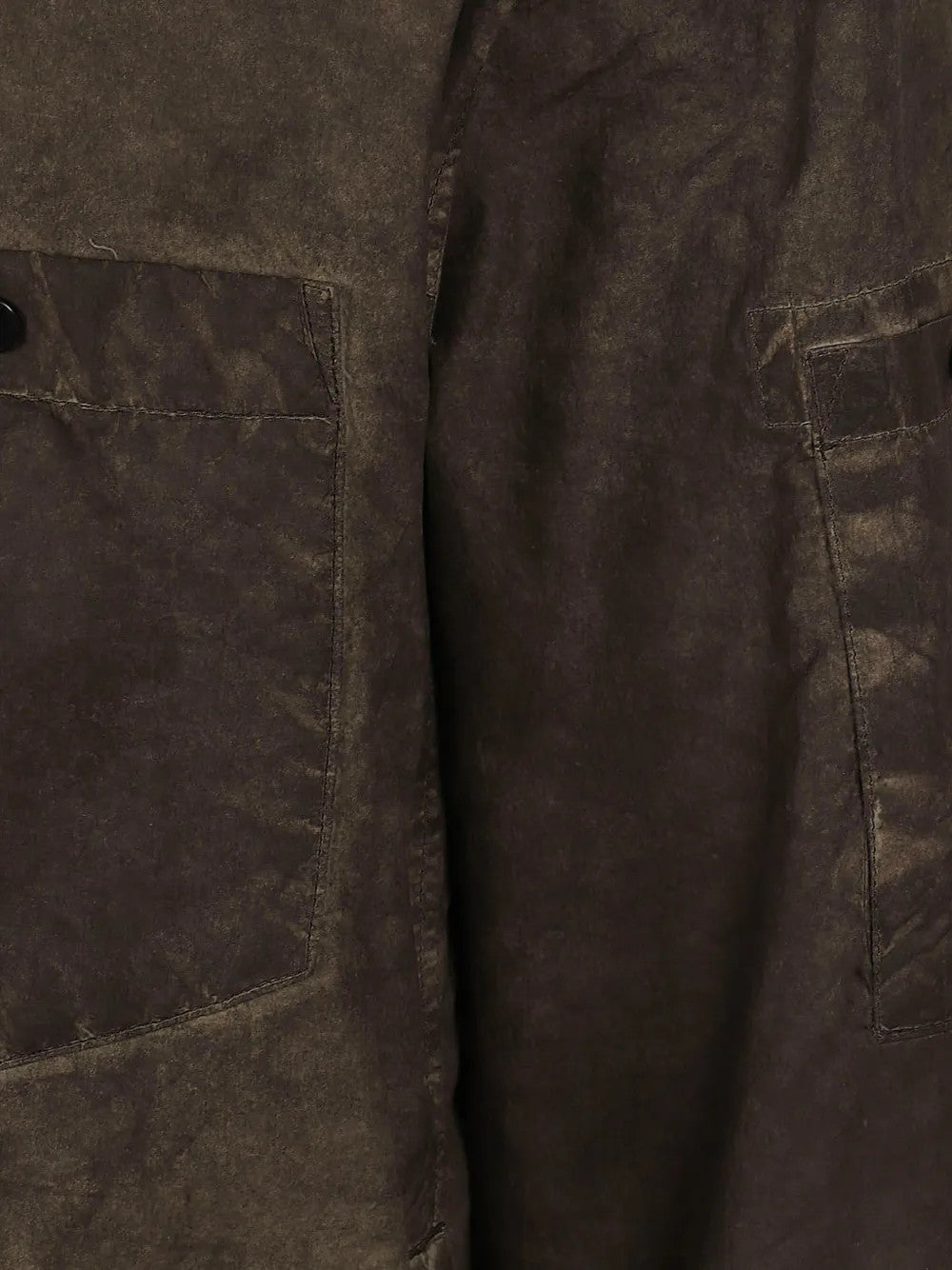 Close up of Brown shirt, showing texture of the 100% polyamide fabric