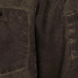 Close up of Brown shirt, showing texture of the 100% polyamide fabric