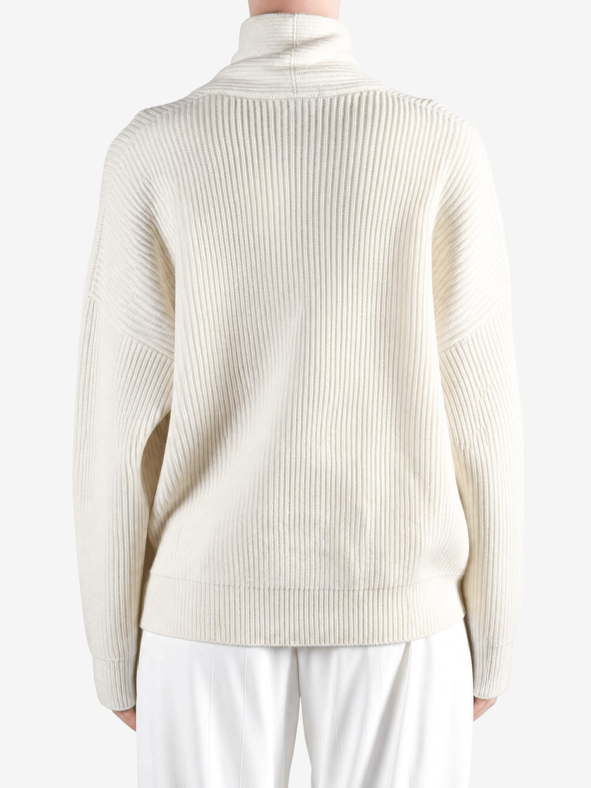 Tan knitwear, front view