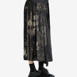 Black skirt worn by a person, showing the skirt fit