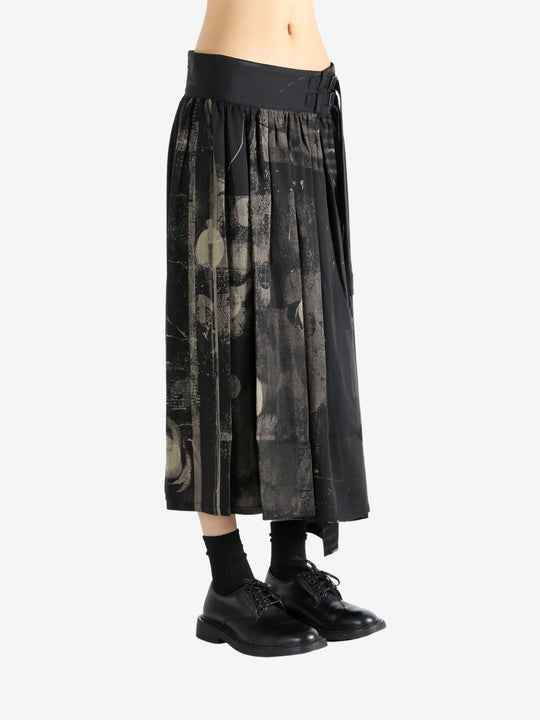 Black skirt worn by a person, showing the skirt fit