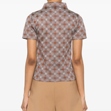 Brown shirt worn by a person, showing the shirt's fit