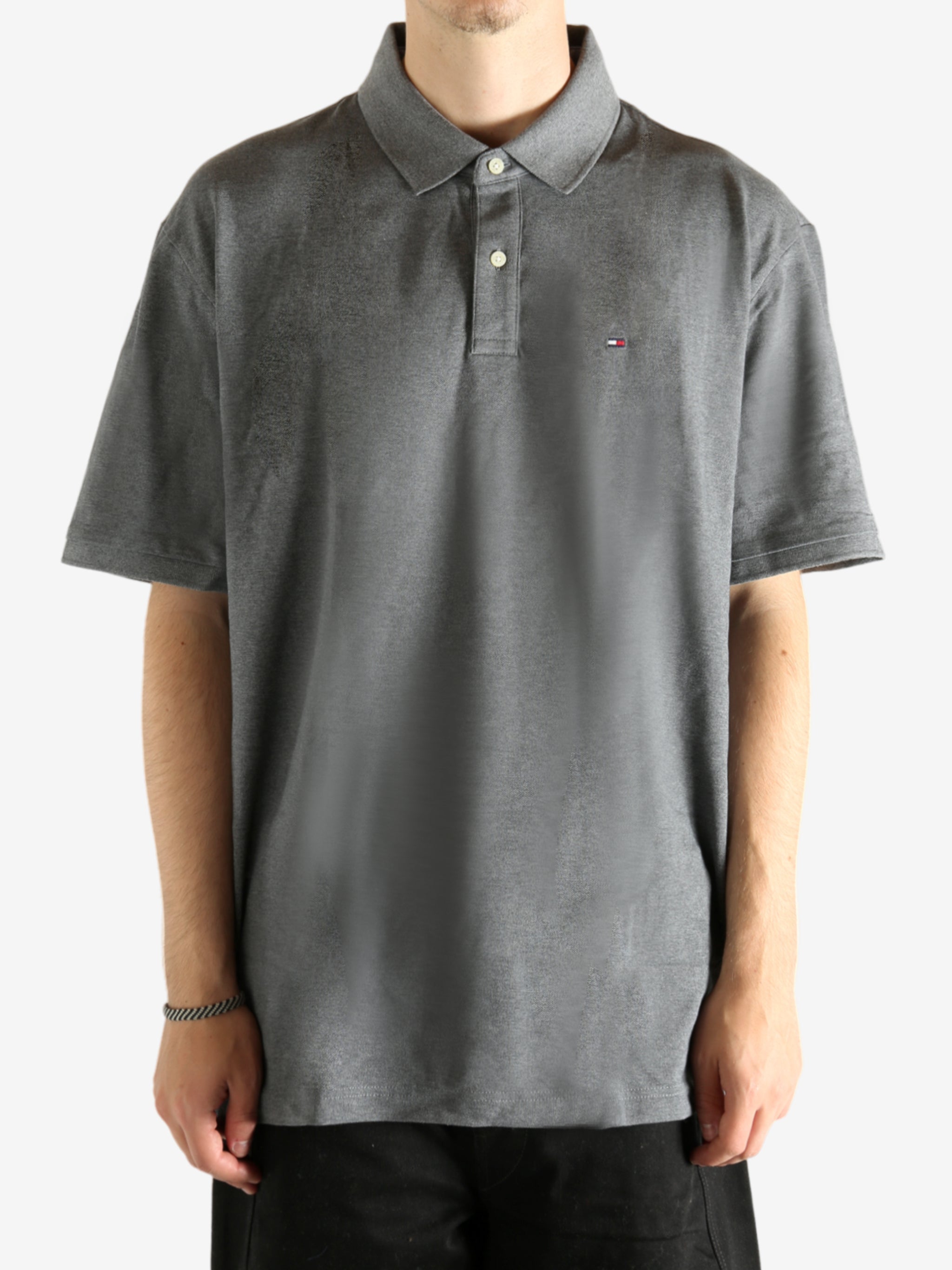 Grey T-shirt worn by a person, showing the T-shirt's fit