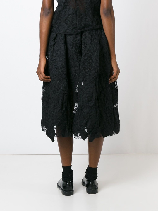 Black skirt worn by a person, showing the skirt fit