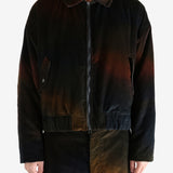 Black jacket worn by a person, showing the jacket's fit