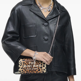 Black bag worn by a person, showing the bag fit