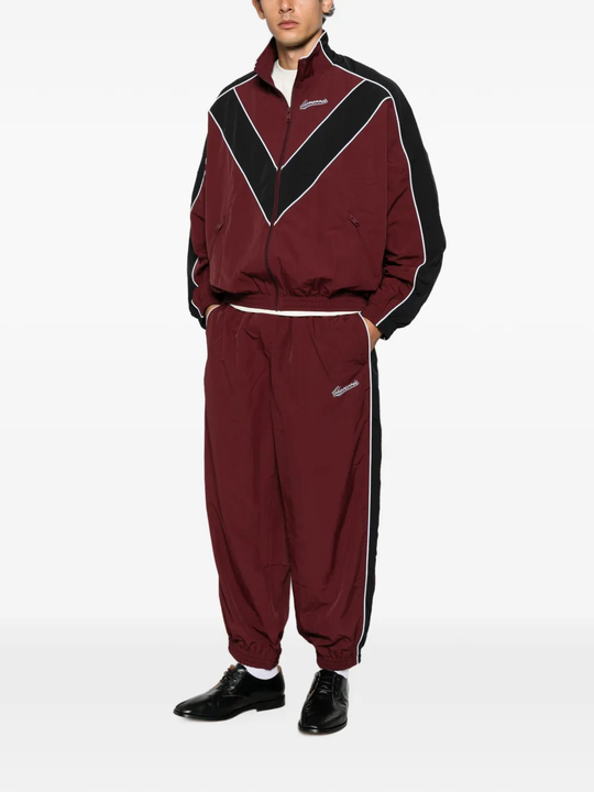 Burgundy pants, full body view