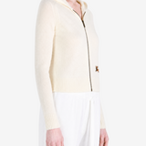 White jacket worn by a person, showing the jacket fit