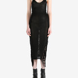 Black dresses worn by a person, showing the dresses fit