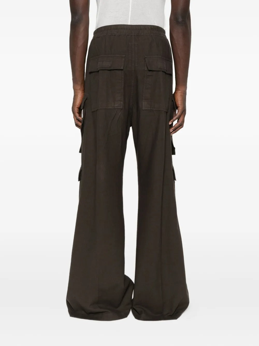 Brown pants worn by a person, showing the pants' fit