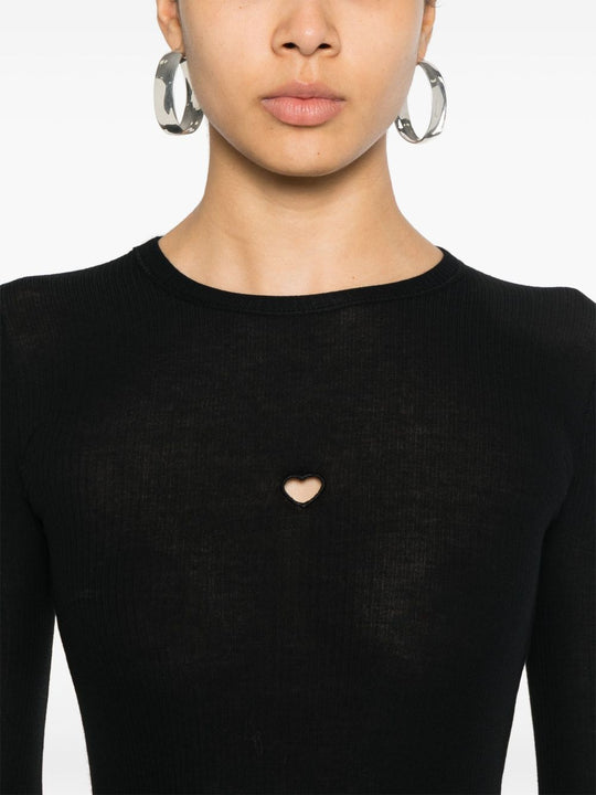 Close up of black T-shirt, showing texture of the cotton blend fabric
