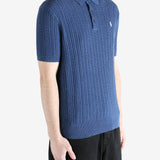 Navy t-shirt worn by a person, showing the shirt's fit