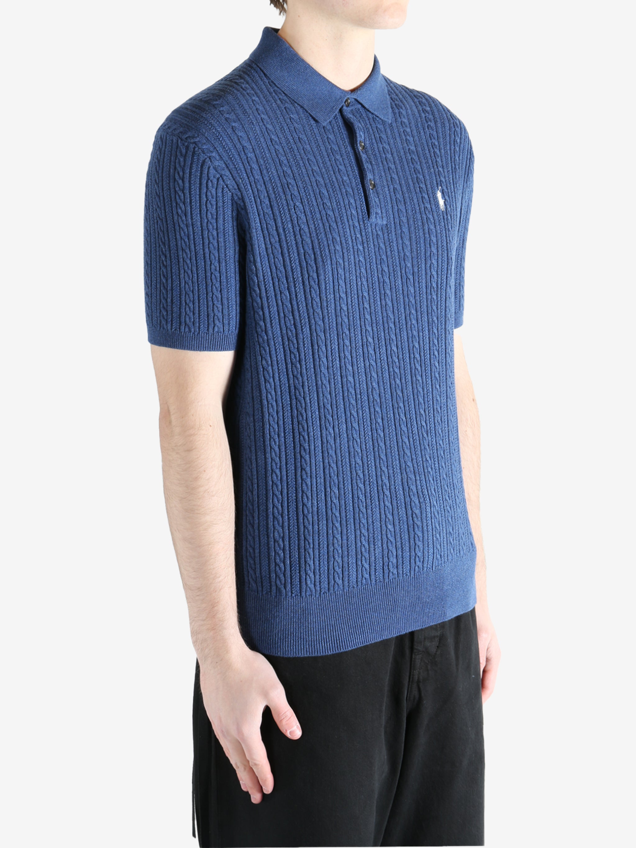 Navy t-shirt worn by a person, showing the shirt's fit