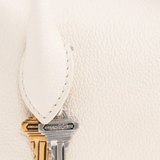 Close up of tan bag, showing texture of the Polyester fabric