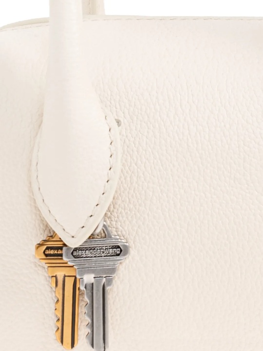 Close up of tan bag, showing texture of the Polyester fabric