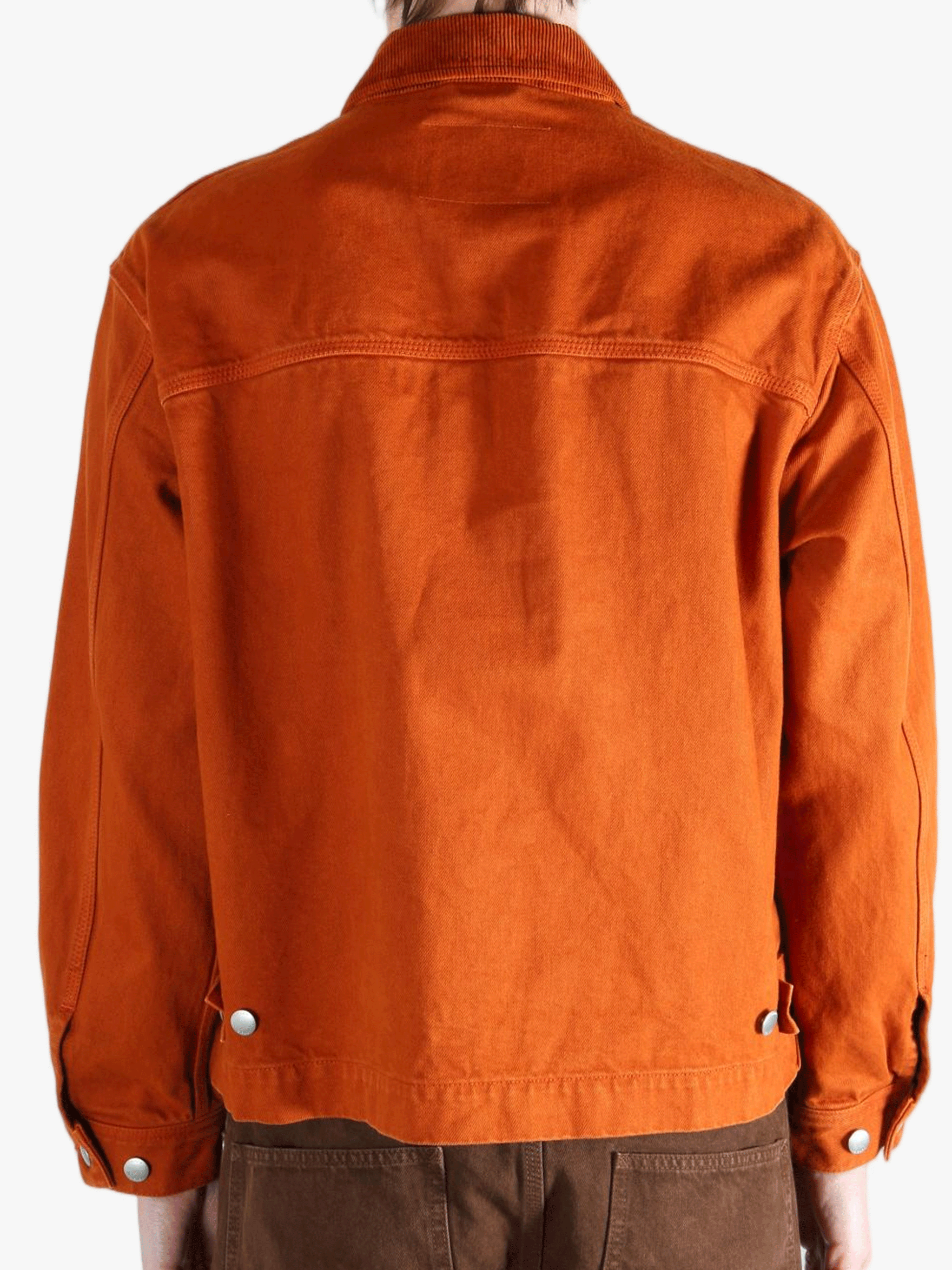 Orange jacket worn by a person, showing the jacket fit